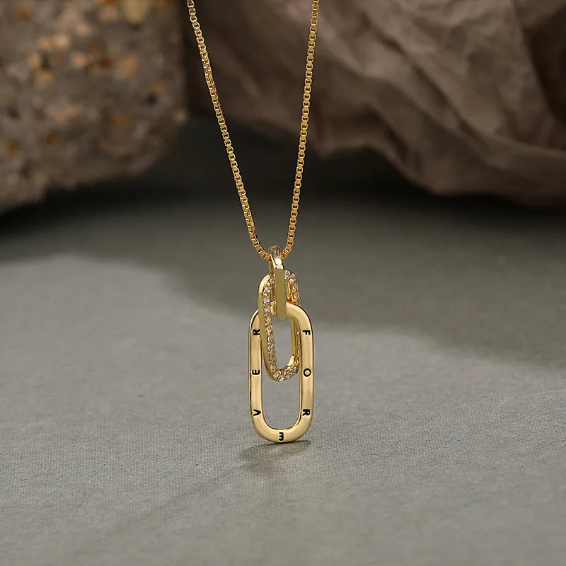 Gold "FOREVER" Engraved Oval Linked Pendant Necklace with Pavé Details