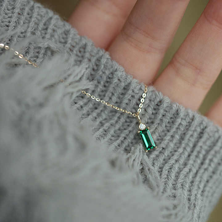 Gold Emerald-Cut Pendant Necklace With Emerald Green Stone