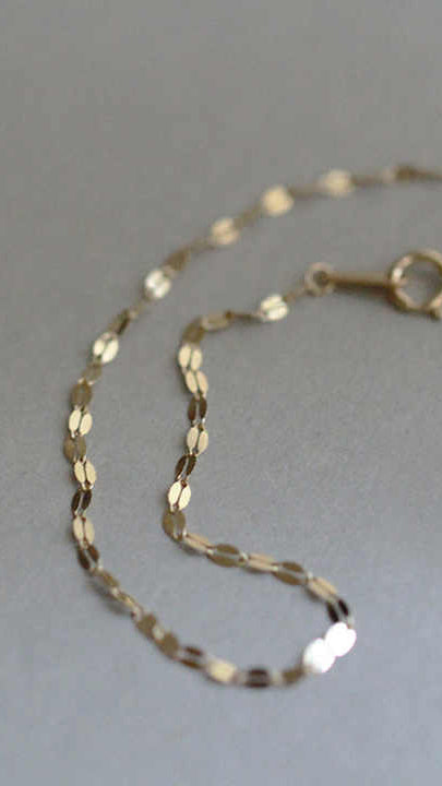 Gold Slim Sparkling Lips Disc Link Bracelet