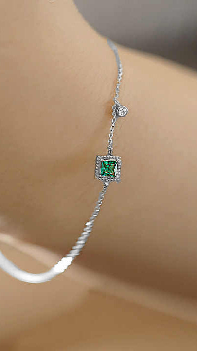 Silver Bracelet with Emerald-Cut Green Gemstone, Pavé Accents, and Bezel-Set Charm